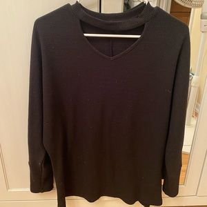 Black long sleeved choker neck style sweater.